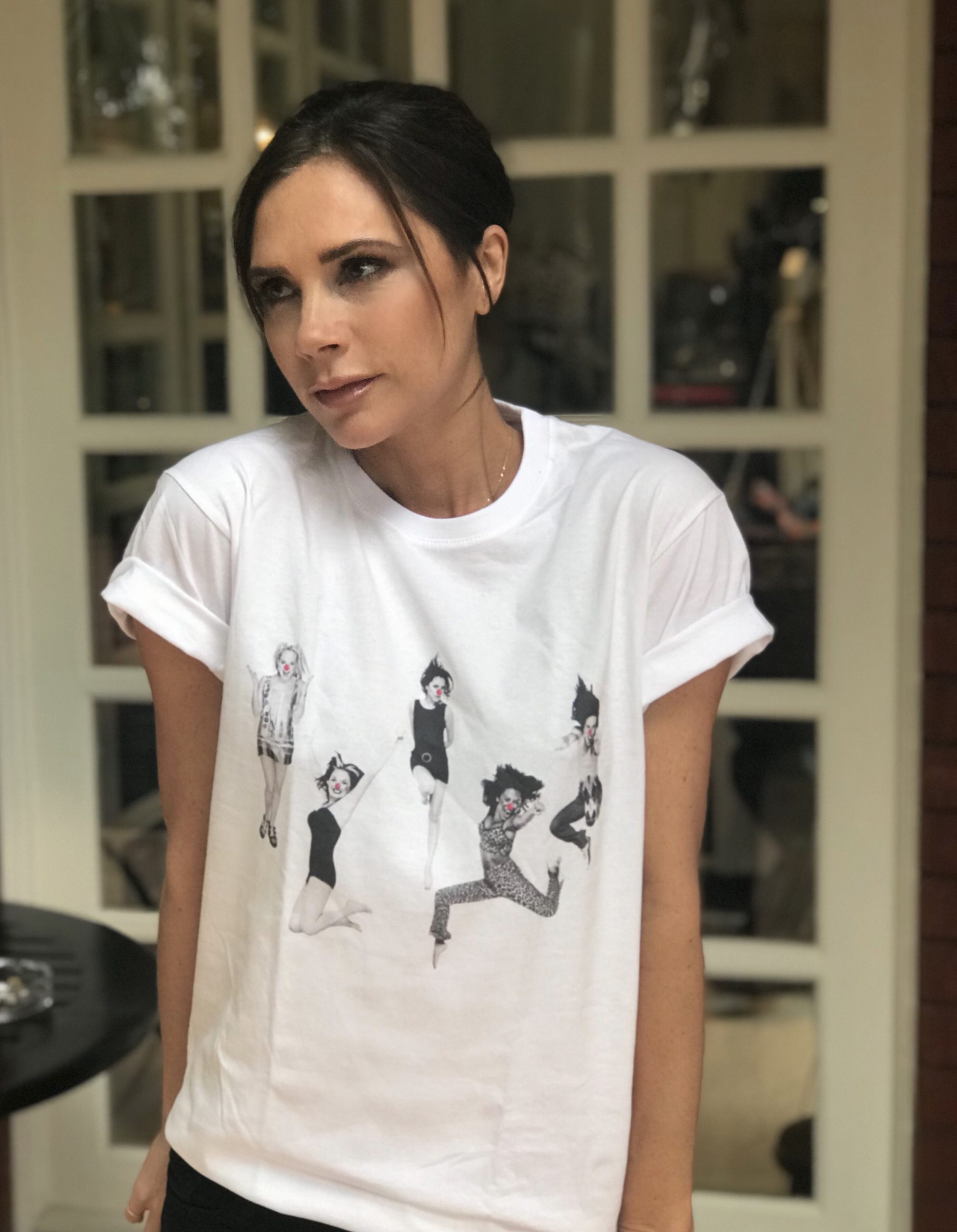Victoria Beckham in a custom Spice Girls RedNoseDay shirt